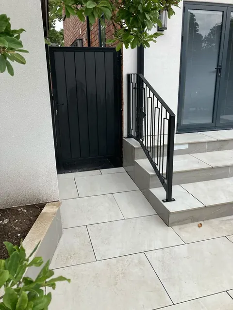 Composite side gate and metalwork, completed installation